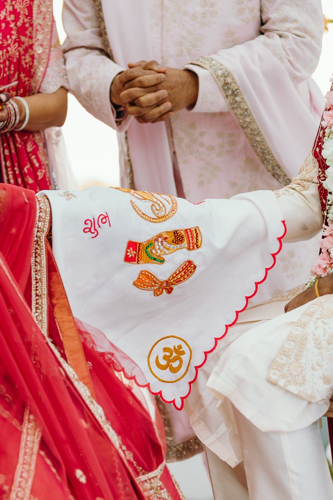 An antarpat cloth held between the couple during the ceremony
